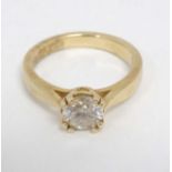 A 14k gold ring set with diamond solitaire CONDITION: Please Note - we do not make