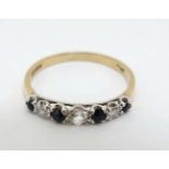 A 9ct gold ring set with diamonds,