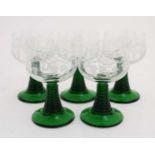 5 mid-late 20thC wine glasses with fruiting vine decoration to bowl and green stem and foot.