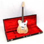 Musical Instruments : a Fender ' American Standard ' Telecaster , having a solid ash body ,