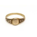 A child's yellow metal ring CONDITION: Please Note - we do not make reference to