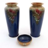 A pair of Royal Doulton Lambeth tall vases, number X8795D 2410,