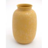 A Poole Pottery yellow 'Calypso' vase with lustre decoration , bears factory stamp to base.