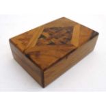 A 20thC walnut cigar box inlaid with diamond pattern and marquetry to top 5" deep x 7 3/4" wide x 2