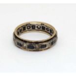 A gold ring set with blue and white stones CONDITION: Please Note - we do not make