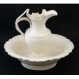 A Leedsware Classical Creamware basin and ewer pitcher , bears impressed makers mark to stand.