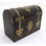 A 19thC dome topped brass bound coromandle stationary box.