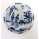 A Chinese blue and white circular ink pot and cover,