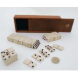 Militaria : An early 19thC boxed part double set of carved bone Dominoes , Napoleonic POW - made ,