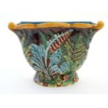 A large Minton Majolica wall planter / jardineire , decorated with fox gloves,