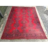 Carpet / Rug: a Turkish woollen carpet, formerly from Brasenose College , Oxford with reds,