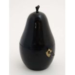 Kitchenalia : A late 20thC / early 21stC novelty tea caddy formed as a pear with ebonised finish.