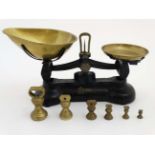 A set of early/mid 20thC English made, Libra Scale Co black cast iron balance scales,