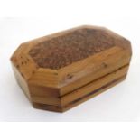 A 20thC walnut box of octagonal form with burr wood decoration .