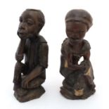 Ethnographic Native Tribal : A pair of carved hardwood African figures ,