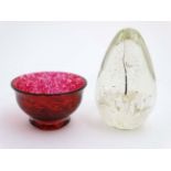 2 items of glassware : A dump formed Art glass paperweight 5 1/2" high and a small glass bowl with