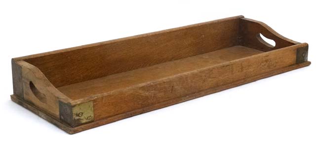 An early 20thC blonde oak desk top book trough / tray with two pierced carry handles and brass - Image 4 of 5