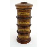 Kitchenalia : A late 20thC treen spice tower.