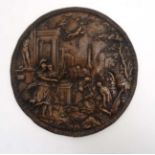 A 19thC cast renaissance style circular relief plaque having Italian classical decoration.