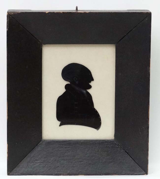 Reverse glass Silhouette : A hand painted image of an early Victorian gentleman with highlights,