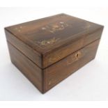 A 19thC rosewood inlaid ladies work box opening to reveal lift out tray etc.