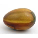 A treen egg with Ruskin style glazes 3 1/8" long CONDITION: Please Note - we do