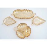 Carnival Glass : 4 glass dishes of floral and foliate form with amber luster finish.