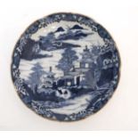 An oriental style blue and white dish.