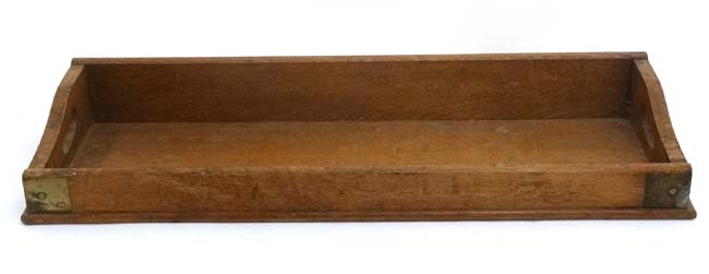 An early 20thC blonde oak desk top book trough / tray with two pierced carry handles and brass - Image 5 of 5