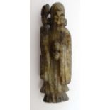 A 19thC black and grey jade figure of Shou ( the god of longevity) 3 5/8" high