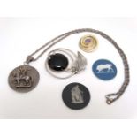 Assorted items to include a silver gilt pendant/ brooch set with facet cut amethyst,