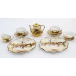 An early - mid 20thC Royal Doulton ''Coaching Days'' series two place tea set, comprising tea pot,