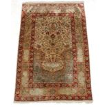 Carpet / Rug: A fine Herake Turkish Silk prayer rug having forward border with Islamic / Koran