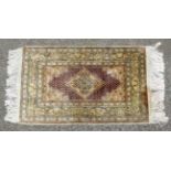 Carpet / Rug: An antique Turkish Silk Prayer Rug with sage green , yellow, black,