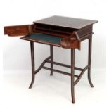 Art Deco : A metamorphic amboyna writing table with strung and cross banded detail.