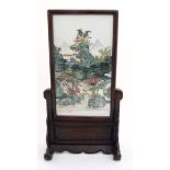 A Chinese famille rose ceramic panel , in wooden frame on wooden stand,