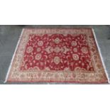 Carpet / Rug : a red ground Ziegler style carpet measuring 79 x 114" CONDITION: