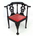 A Victorian ebonised mahogany corner chair with drop in seat 32 1/4" high CONDITION: