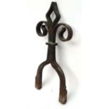 Architectural Salvage : a black painted wrought iron Fleur De Lys ( in the Gothic manner),
