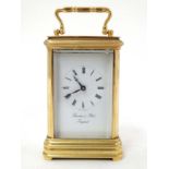 Thwaites & Reed Carriage Clock : a five bevelled glass gilded brass cased Carriage Timepiece ,
