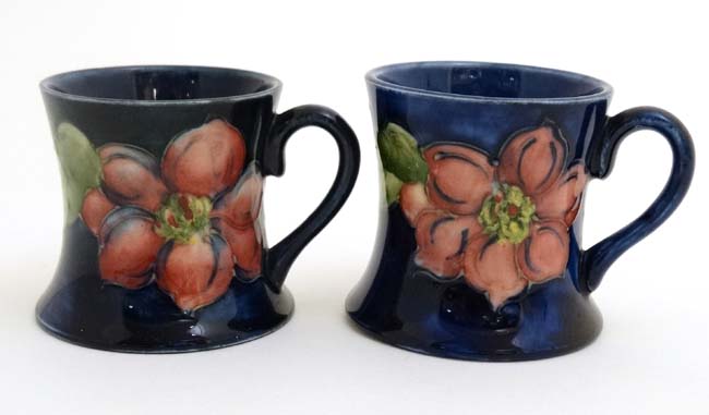A pair of Moorcroft Miniature ' Clematis ' pattern tankards on a cobalt blue ground , - Image 4 of 7