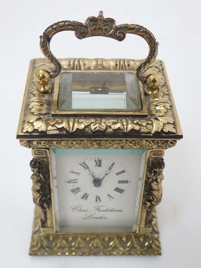 A 19thC Gilt brass ' Chas Frodsham ' Carriage Clock : an ornate cast and chased 5 bevelled glass - Image 6 of 11