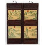 A large pair of Chinese ceramic panels in wooden frames,