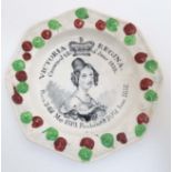 A rare Victorian child's pottery plate of octagonal form with transfer printed image to centre