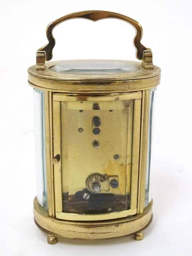 Oval Miniature Mappin & Webb Ltd Carriage Clock : a 4 shaped and bevelled glass with oval bevelled - Image 9 of 11