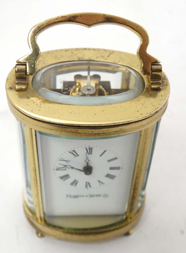 Oval Miniature Mappin & Webb Ltd Carriage Clock : a 4 shaped and bevelled glass with oval bevelled - Image 6 of 11