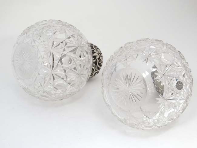 A pair of cut glass scent bottle of spherical form with silver tops hallmarked Chester 1904 maker - Image 3 of 5