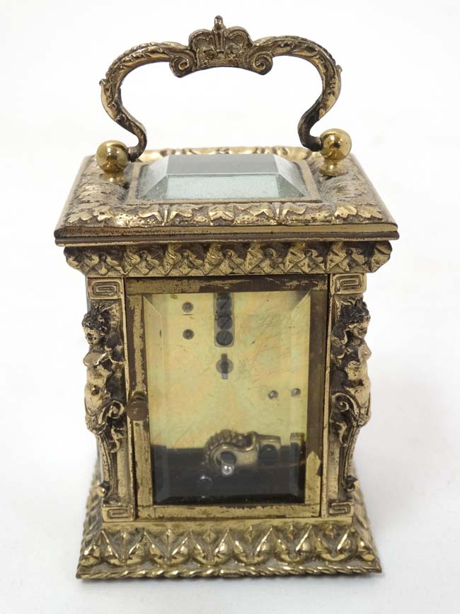 A 19thC Gilt brass ' Chas Frodsham ' Carriage Clock : an ornate cast and chased 5 bevelled glass - Image 8 of 11