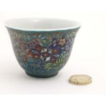 A small Japanese style cloisonné on porcelain bowl,