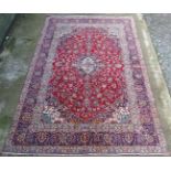 Carpet / Rug : A super hand made woollen , pile carpet with light blue central ground, dark blue,